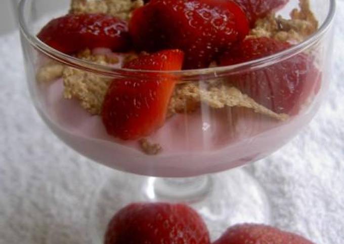 Yogurt dessert with strawberries and honey