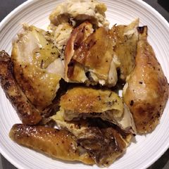A picture of Roast Chicken in Oven.