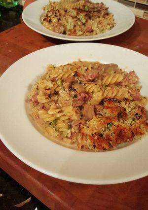 A picture of Sausage and Mushroom Pasta in a Parmesan Cream.