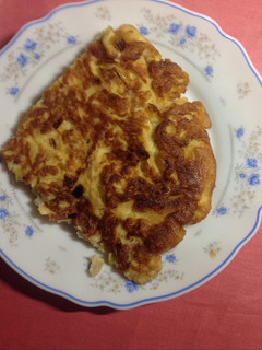 Una foto de Tortilla de cebolla, ajo, puerro y queso rallado parmesano