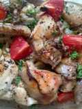 Roasted chicken with herbs and fresh tomatoes