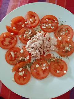 Una foto de Tomate aliñaos