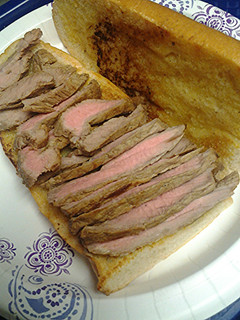 A picture of Steak on Cuban bread.