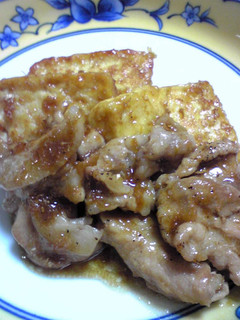 A picture of Ginger Pork and Firm Tofu with Oyster Sauce.