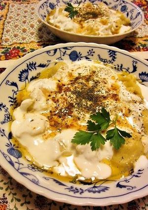 A picture of Turkish Manti (Boiled Dumplings).