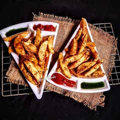 A picture of Potato Wedges.