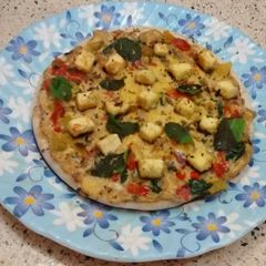 A picture of Cheesy Paneer Egg Pizza.