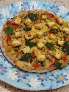 A picture of Cheesy Paneer Egg Pizza.