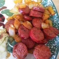 A picture of Breakfast (beef)sausage and onions.