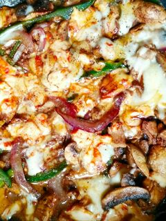 Una foto de Champiñones con Pollo y Jengibre Gratinados