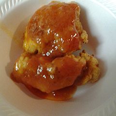 A picture of Fried chicken with butter garlic sauce.
