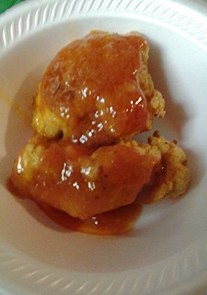 A picture of Fried chicken with butter garlic sauce.