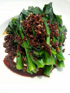 A picture of Chinese Brocoli With Garlic And Parsley Soy Sauce.
