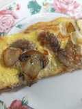 Omelette de champiñones y queso fresco