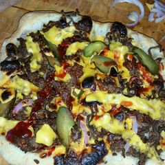 Wood fired cheeseburger pizza A picture of Wood fired cheeseburger pizza.