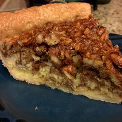A picture of Pecan Pie with Cream Cheese Filling.