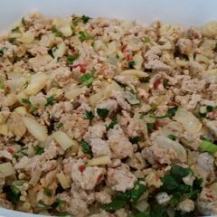 A picture of Thai lettuce wraps with ground pork.