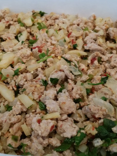 A picture of Thai lettuce wraps with ground pork.