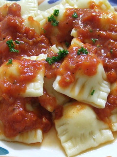 A picture of Potato Ravioli In Tomato Sauce.