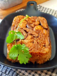 A picture of Lo Mai Gai - Chinese Glutinous Rice with Chicken-Mushrooms.