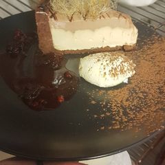 A picture of Choclote Chambord &Baileys cheesecake served with spun Toffee.