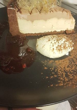 A picture of Choclote Chambord &Baileys cheesecake served with spun Toffee.