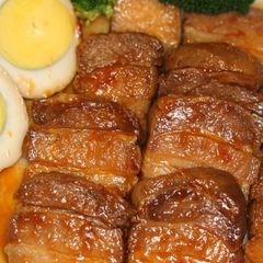 A picture of Pork Belly Simmered in Ketchup.