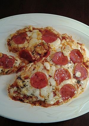 A picture of Chicken Parmesan Pizza.