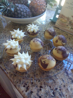 A picture of Vanilla chocolate swirl cupcakes.