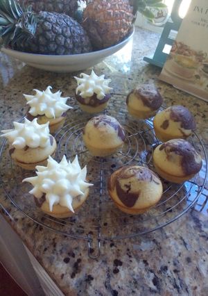 A picture of Vanilla chocolate swirl cupcakes.