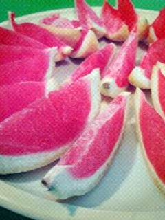 A picture of Strawberry Lemonade Lemon Peel Shots.