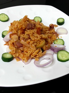 A picture of LG SPICY ROASTED PORK BAKE RICE.