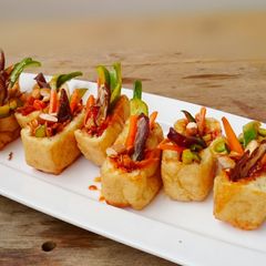 A picture of Honey Ginger Tofu Salad With Almond And Medjool Dates Appetizer.