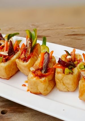 A picture of Honey Ginger Tofu Salad With Almond And Medjool Dates Appetizer.