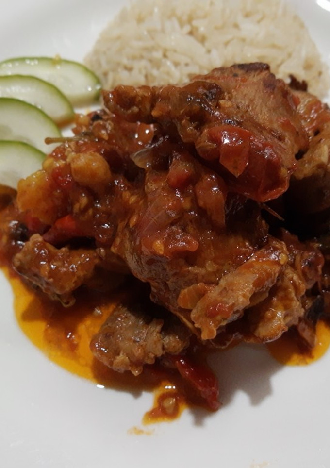 Una foto de Masas de cerdo en salsa de tomate 🍅
