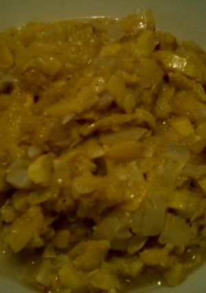 A picture of Yellow zucchini and onion.
