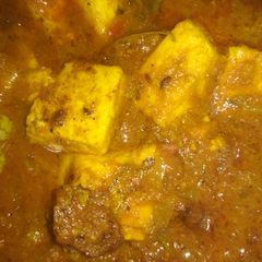 A picture of Tomato paneer.