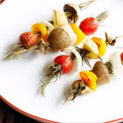 A picture of Roasted Vegetables On Rosemary Skewers.