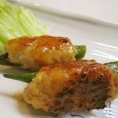 A picture of Chicken Tsukune Wrapped Around Okra.
