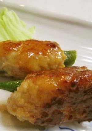 A picture of Chicken Tsukune Wrapped Around Okra.