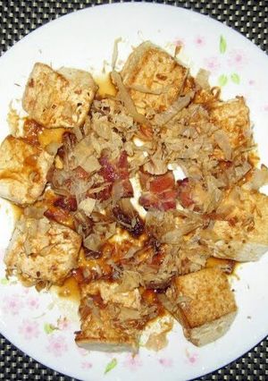 A picture of Fried Tofu Top Bacon And Shaved Mackerel.