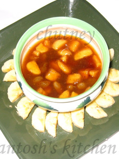 A picture of Tamrind jaggery chutney with banana.