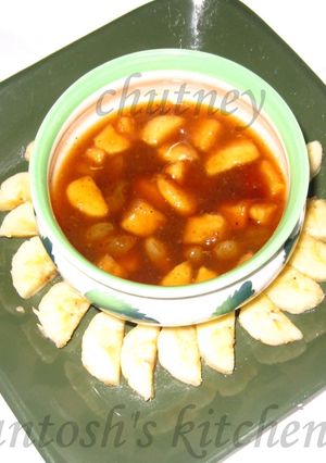 A picture of Tamrind jaggery chutney with banana.