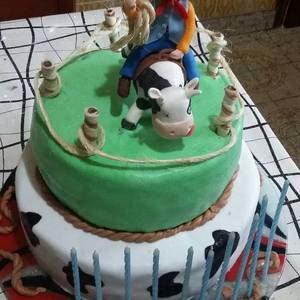 Torta decorada con vaquero o cowboy para Gena 10 años