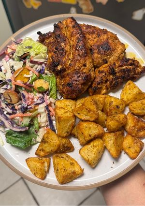 A picture of Blackened Chicken & Famous Crunchy Potato Roasties.