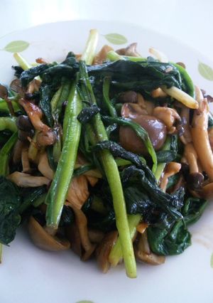 A picture of Ramps and Mushroom Consommé Butter Stir-fry.