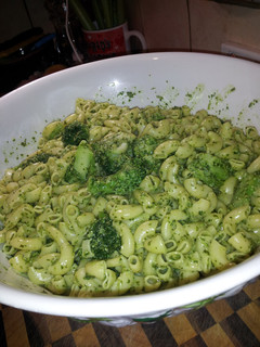 A picture of Pesto pasta with broccoli.