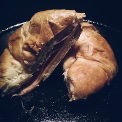 A picture of The "im feeling fancy" croissant sandwich.
