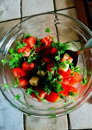 Une photo de Salade de cresson et tomates