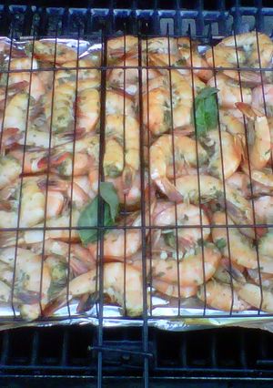 A picture of Shrimp grilled with basil.